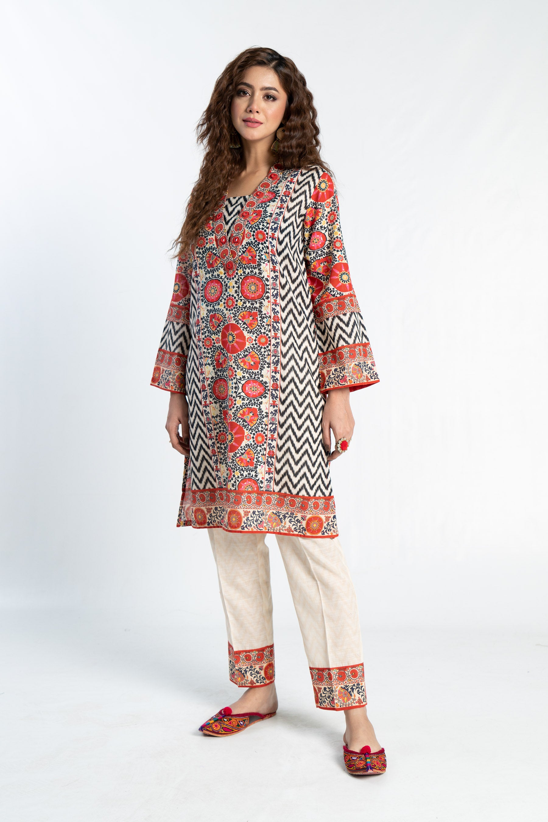 Suzani Ikat in Multi coloured Printed Slub Khaddar fabric