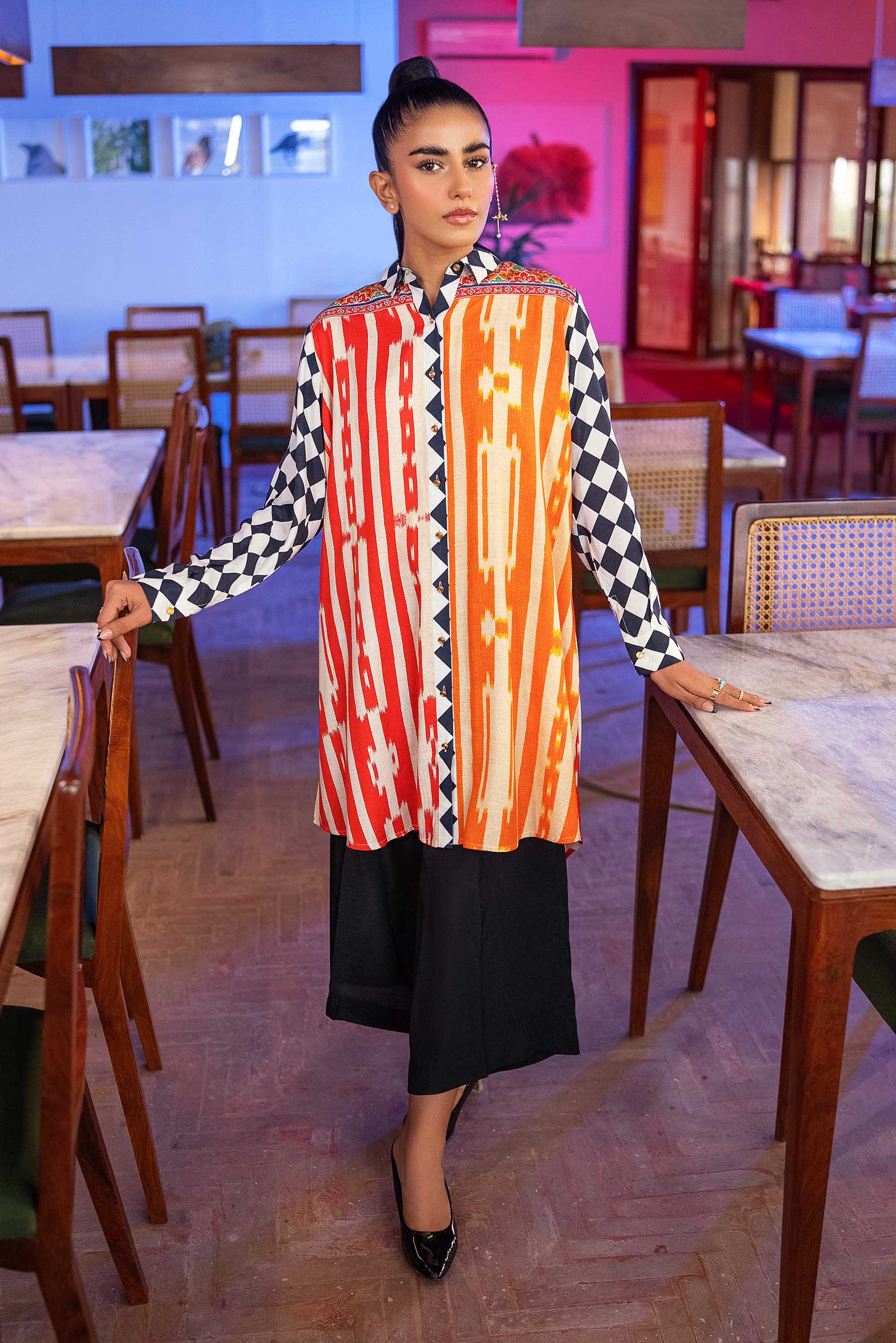 Bold Ikat in Multi coloured Pak Raw Silk fabric