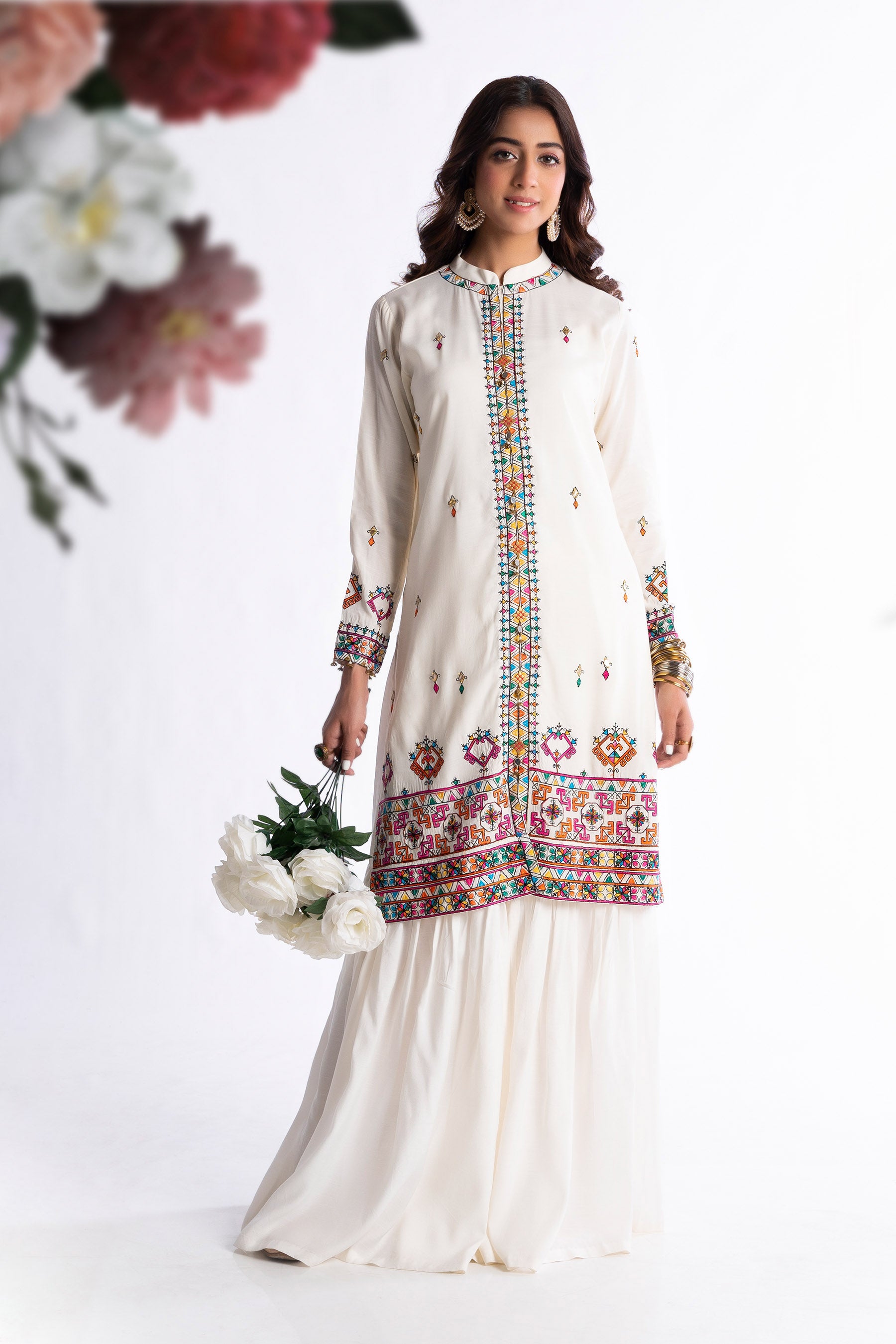 White Tribal in Off White coloured Pak Raw Silk fabric